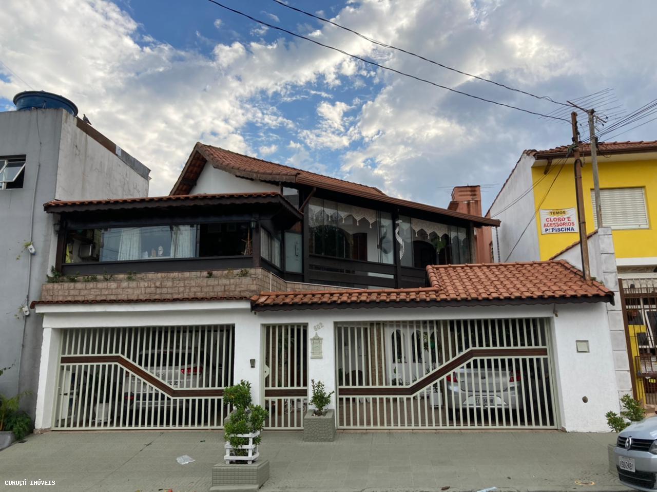 Sobrado à venda com 7 quartos, 200m² - Foto 1